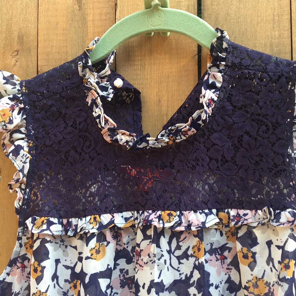 Sheer floral top with lace and back tie